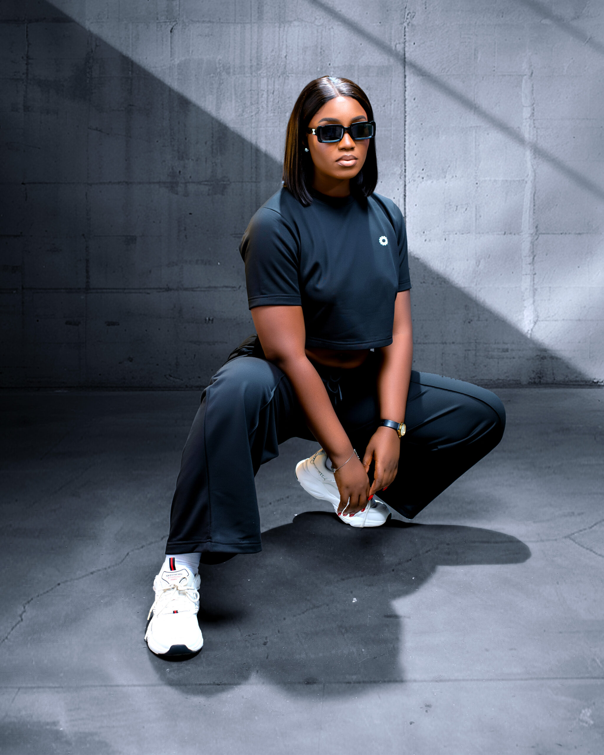 Second image of Noir Flux Cropped Tee and Flare Pants Set
