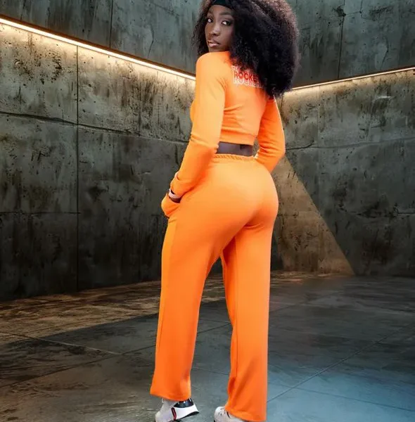 Noir Flux Cropped Crew Neck and Flare Pants Set In Orange.